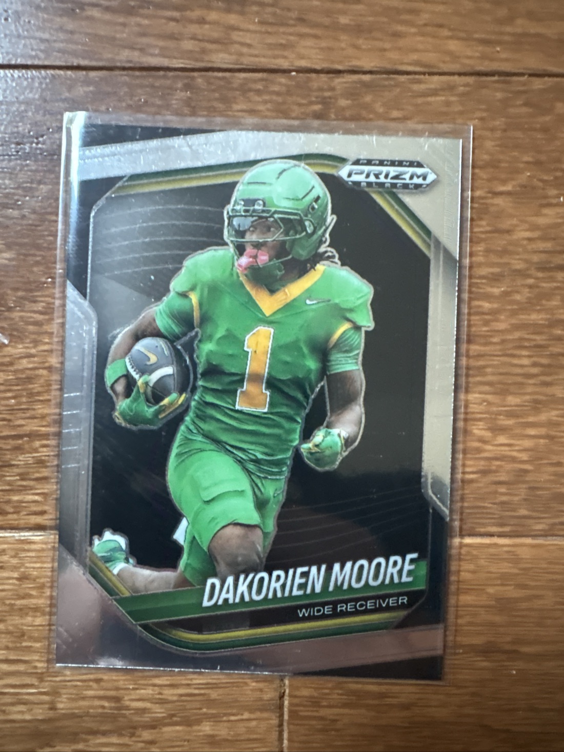 2025 Panini Prizm Black Dakorien Moore #169